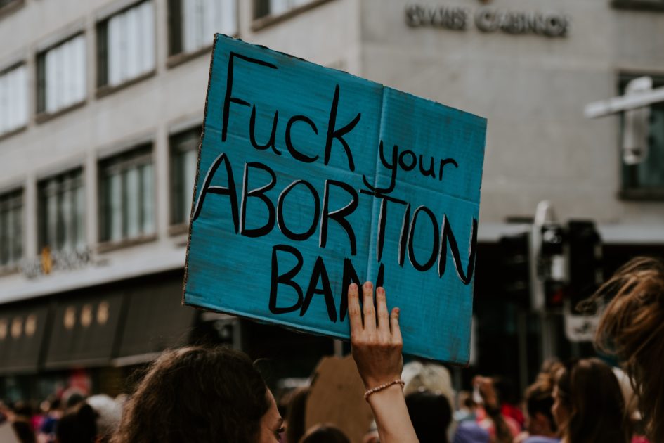 Sign saying "Fuck Your Abortion"